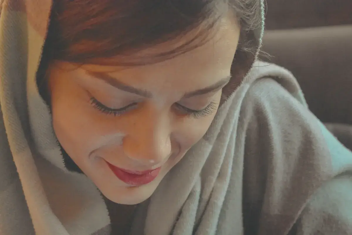 A person sleeping in a car