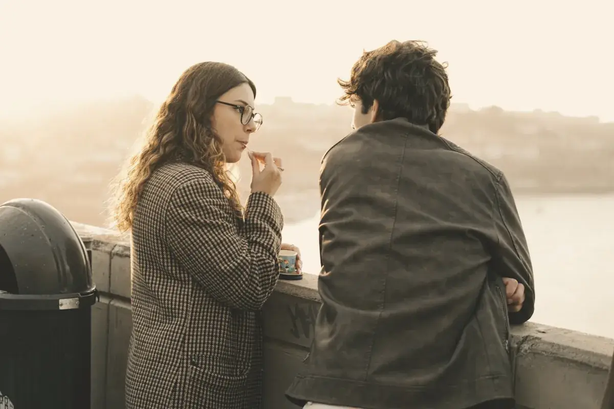 A man and a woman standing next to each other
